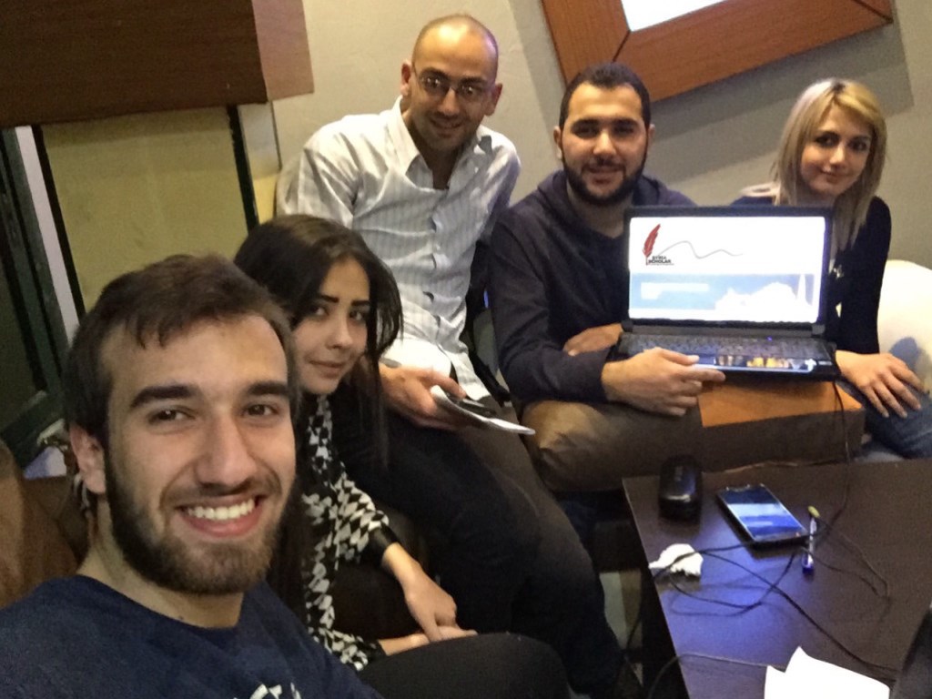 Syrian medical students receiving a tutorial on SyriaScholar.com from doctors in the United Kingdom.(Source: http://syriascholar.com/about-us/history/)